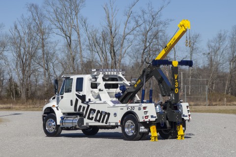 white vulcan v-30 on an international chassis stretched out rear