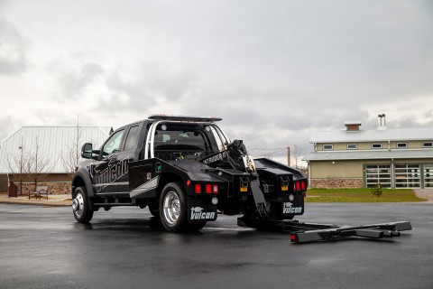 black vulcan 812 intruder II wrecker with underlift folded and extended