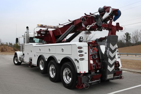 white and red vulcan 950 rotator in a parking lot