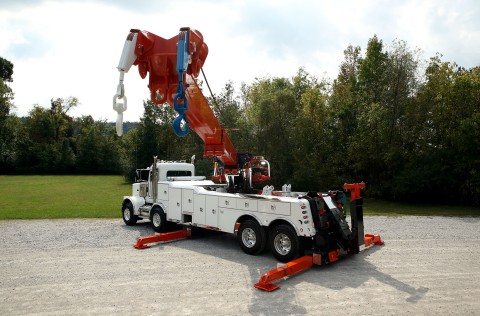 white and orange vulcan 950 rotator stretched out showing the end of the boom