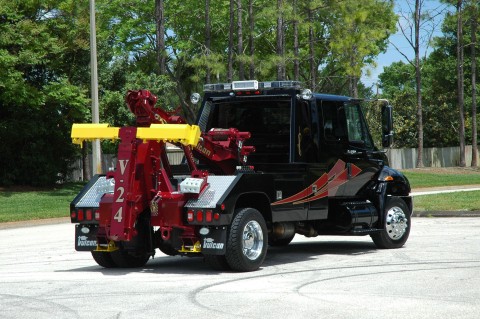 black and red vulcan v24 in a parking lot